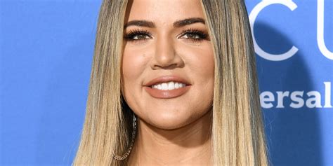 Khloe Kardashian shows off her abs in leopard bikini .